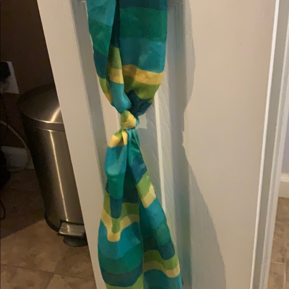 Green and yellow scarf could be Saint Patty’s day